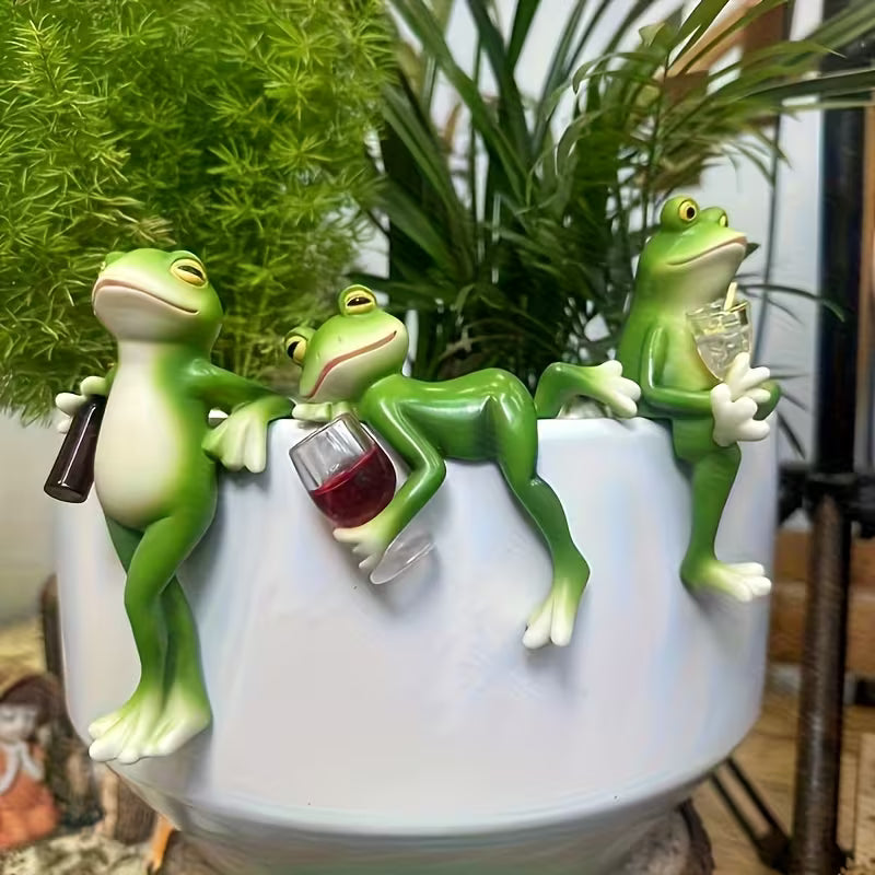 Three Frog Sculptures with Drinks
