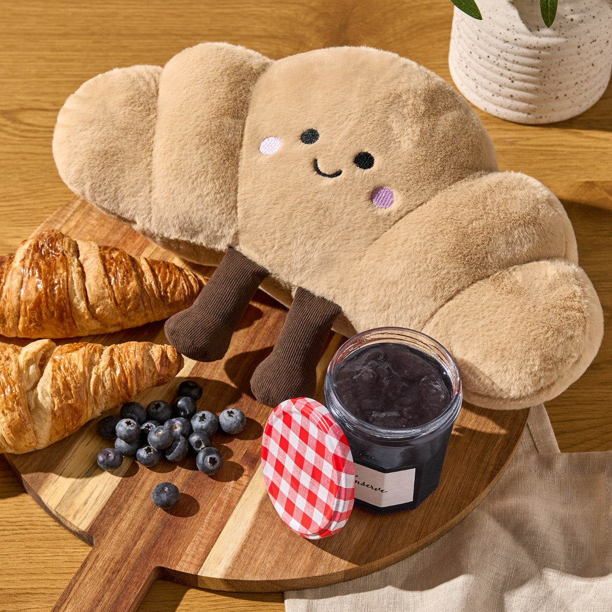 Claude The Croissant Cushion - Brown